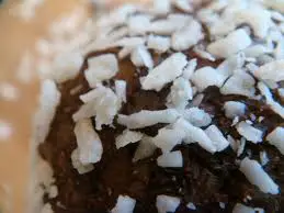 Shredded coconut is used to accent the raw chocolate flavor. 