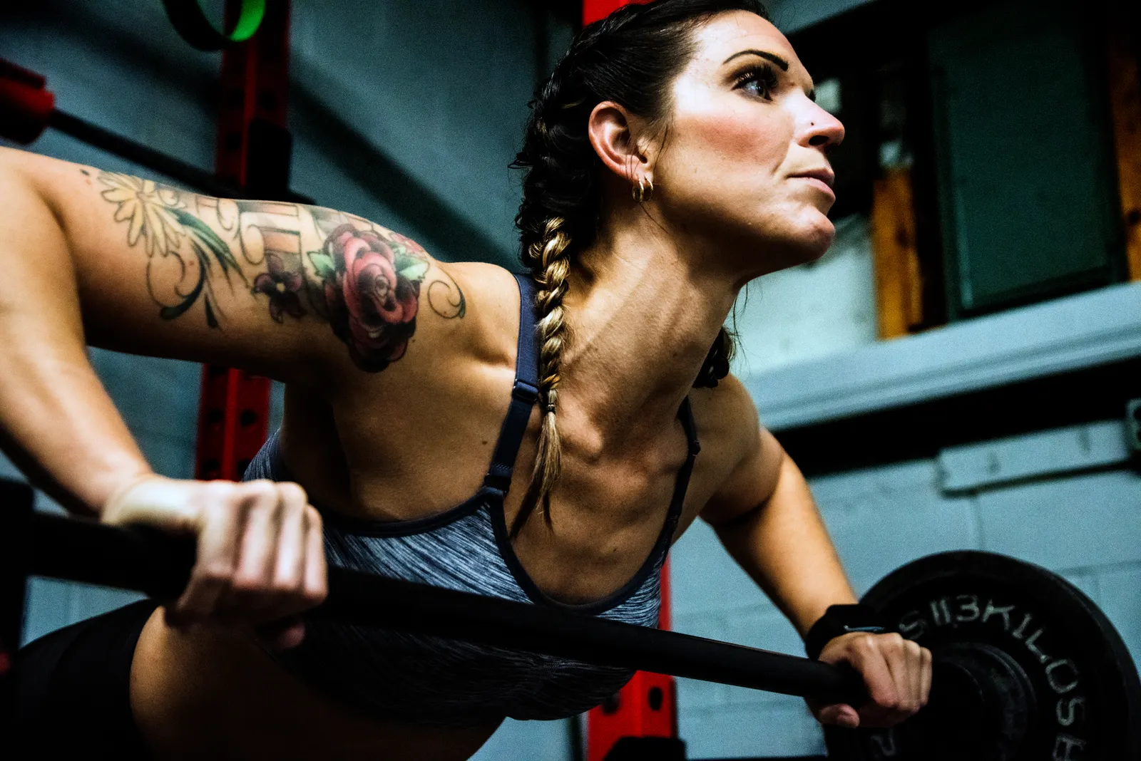 Member lifting a barbell