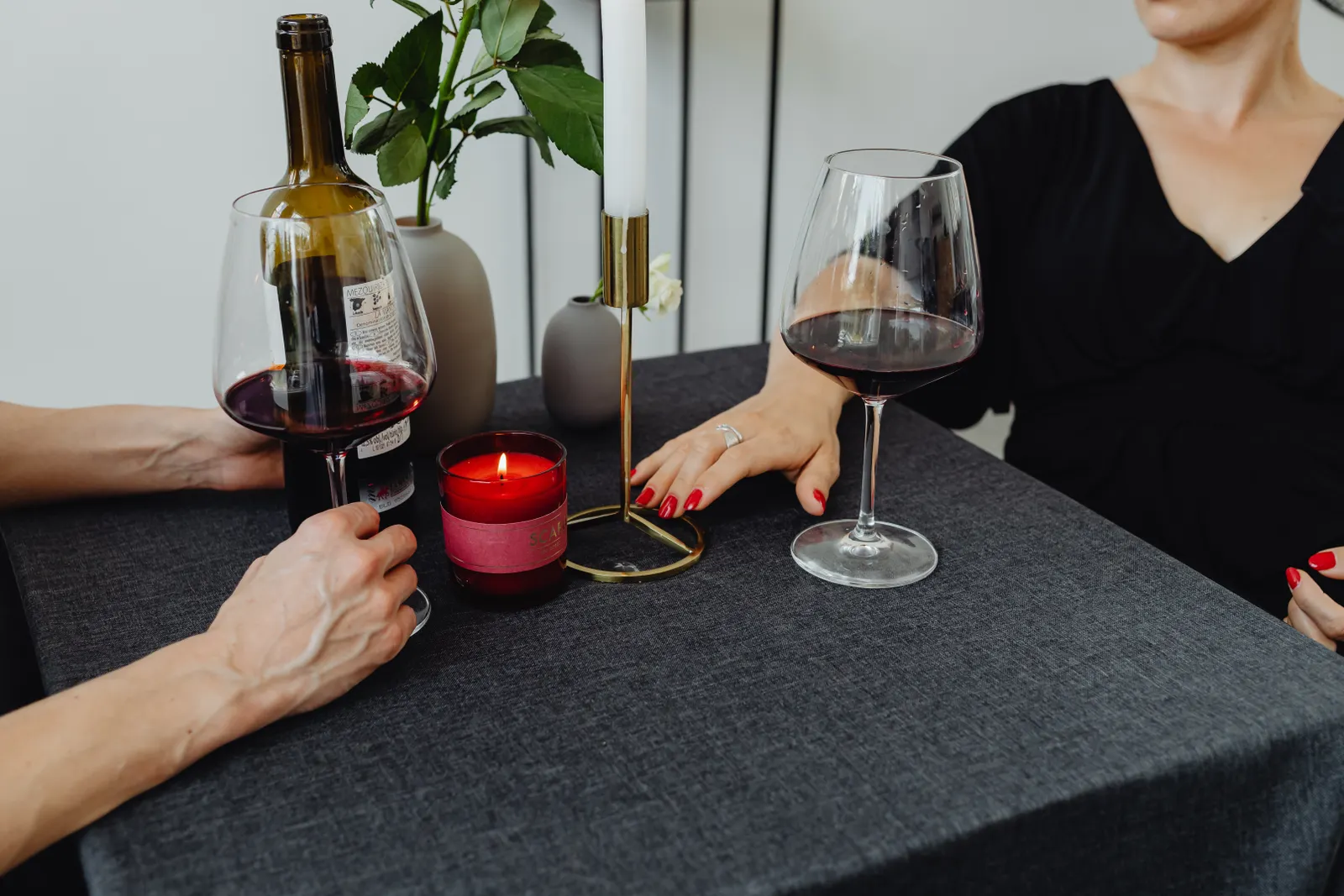 Dinner table with wine and candles