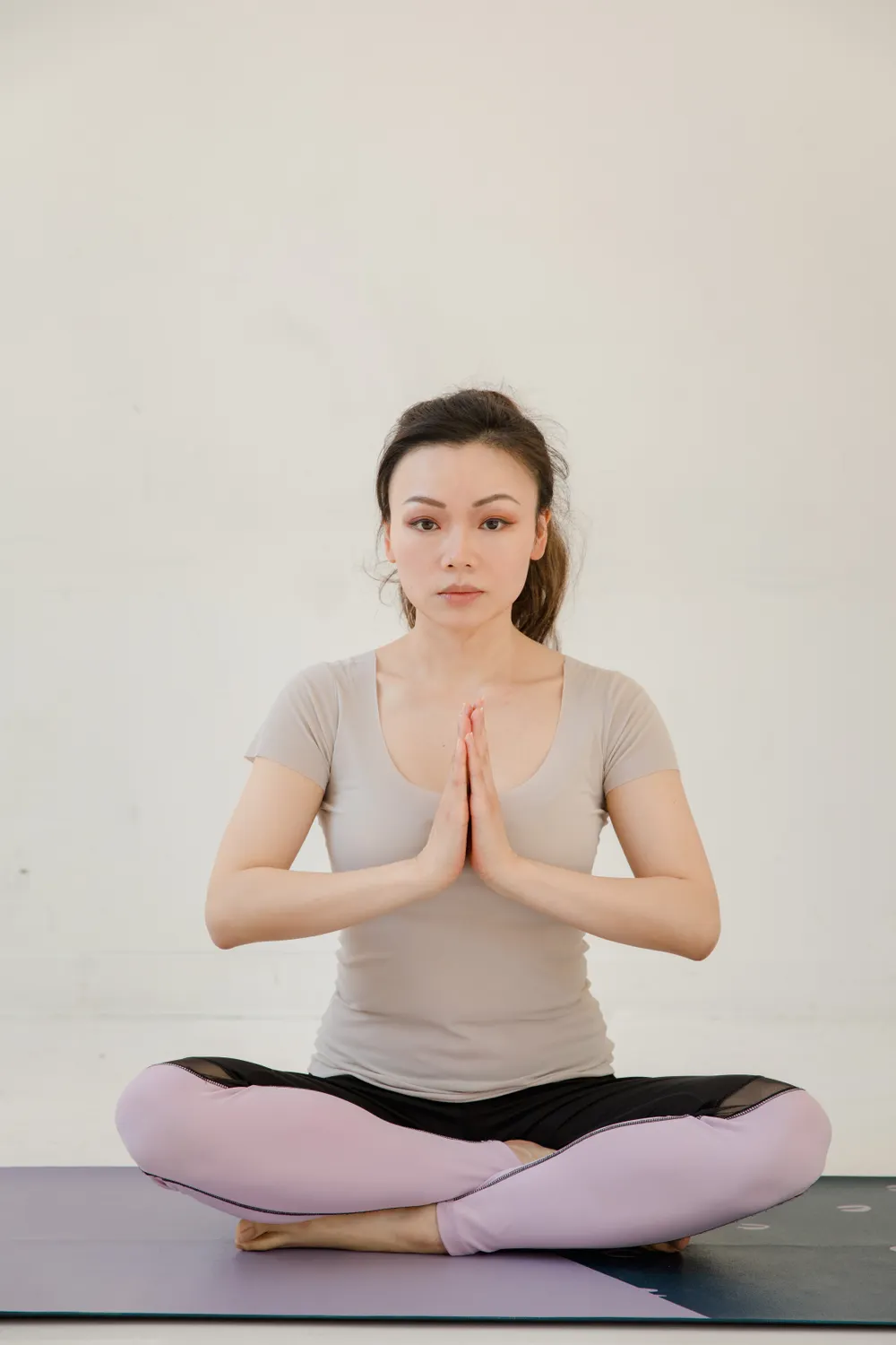 Student in a seated pose